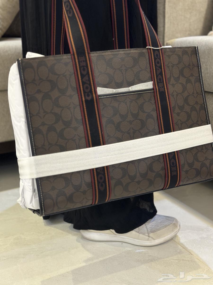 شنطة من ماركة كوتش63326765256451113