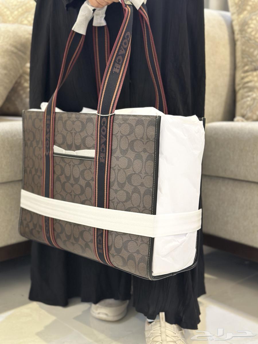 شنطة من ماركة كوتش63326765256451111