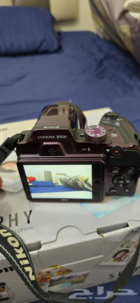 Camera with photo printer63326507091203114