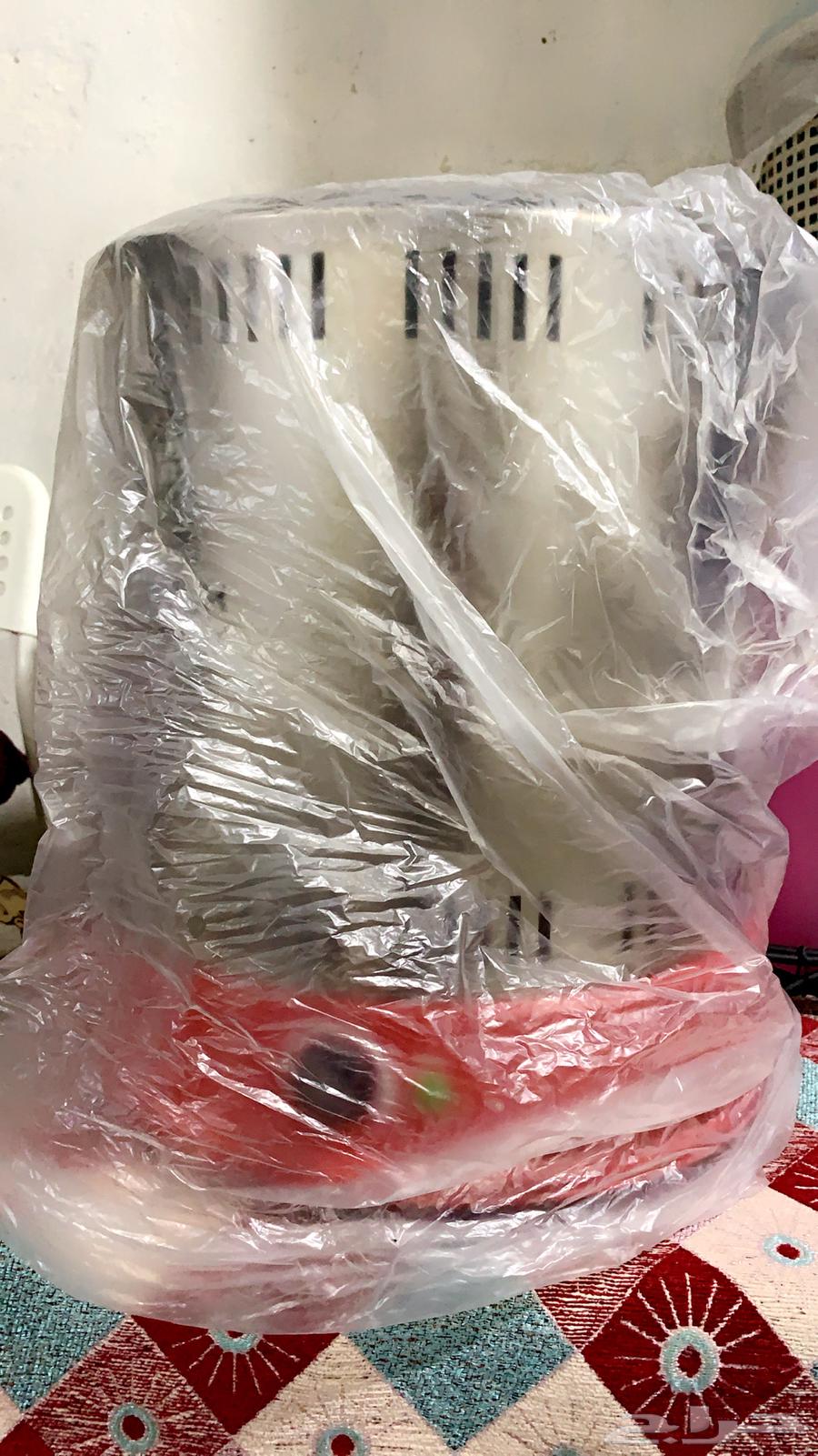 A new Hommix grill device, unused, still in its original carton.63325516680578112