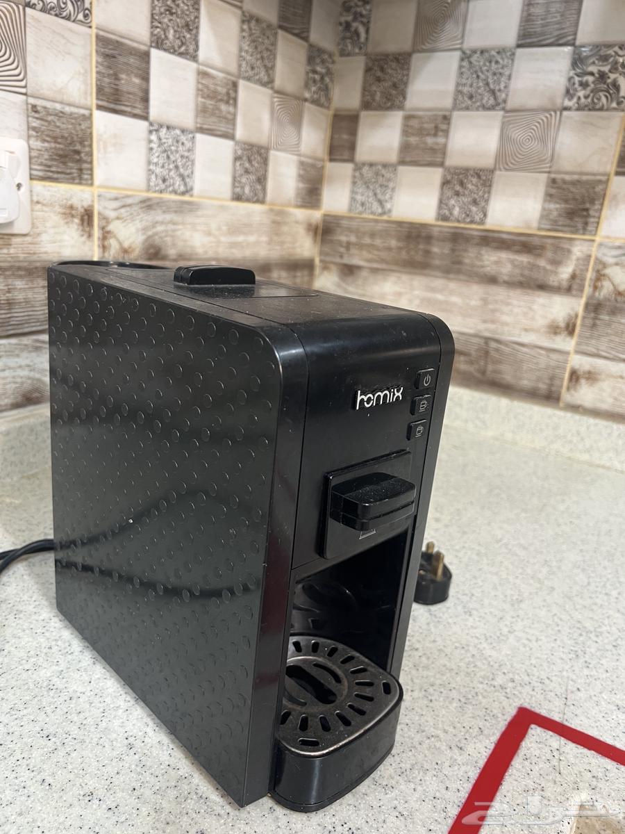 An elegant and clean coffee machine, lightly used.63325092231298111