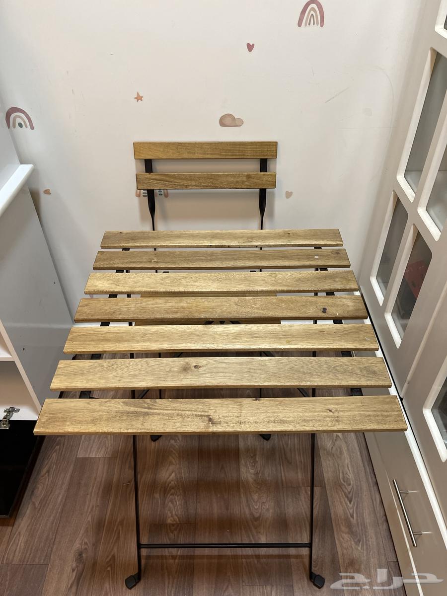 Two chairs and a table63325982725378110