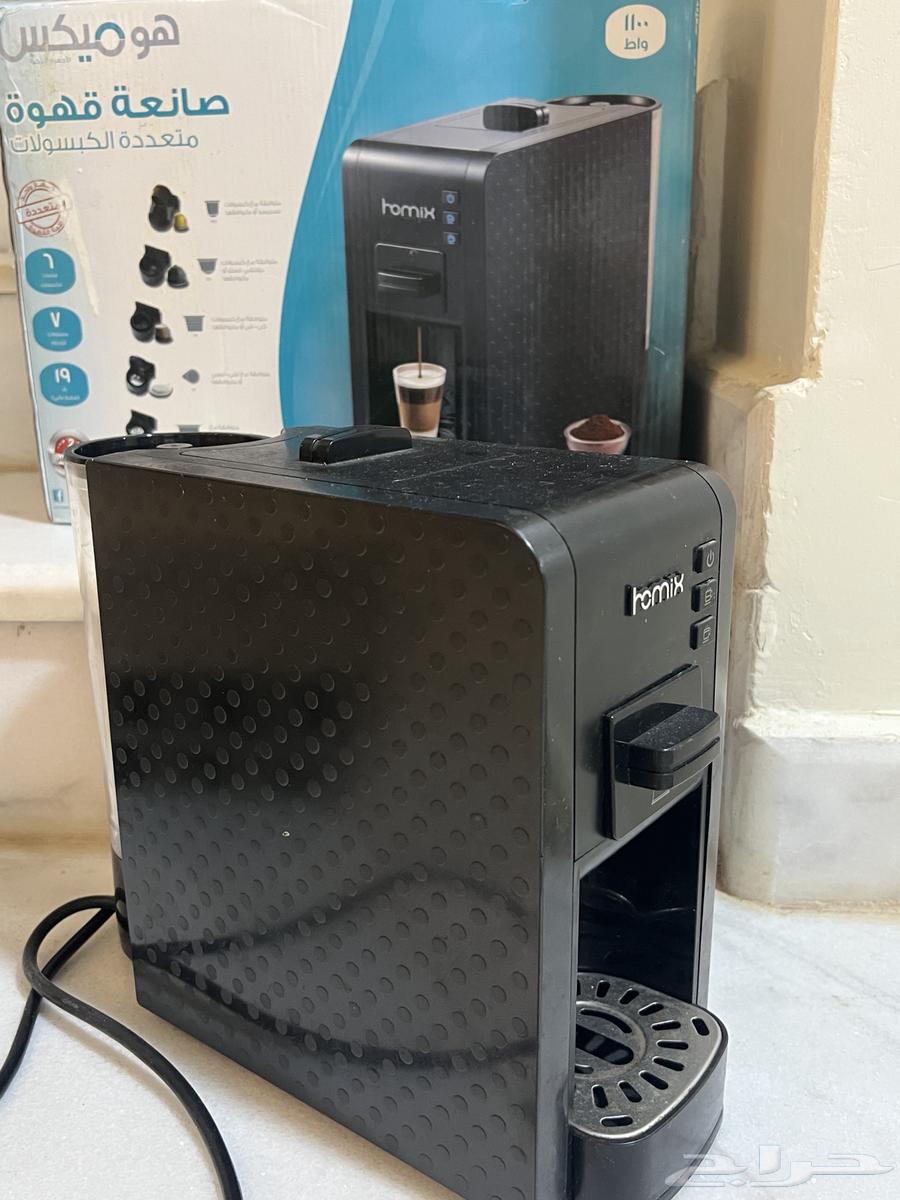 An elegant and clean coffee machine, lightly used.63325092231298112