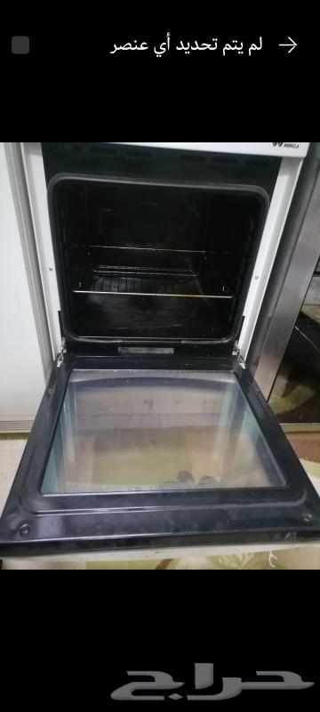 Electric oven in the middle with 4 burners above and electric oven below63027059877890111