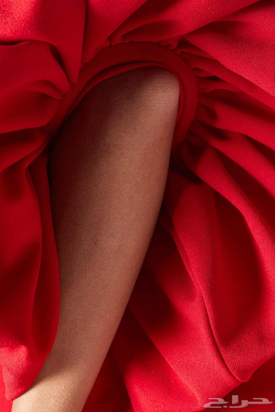 A red dress by designer Zeena Zaki63325268303233114