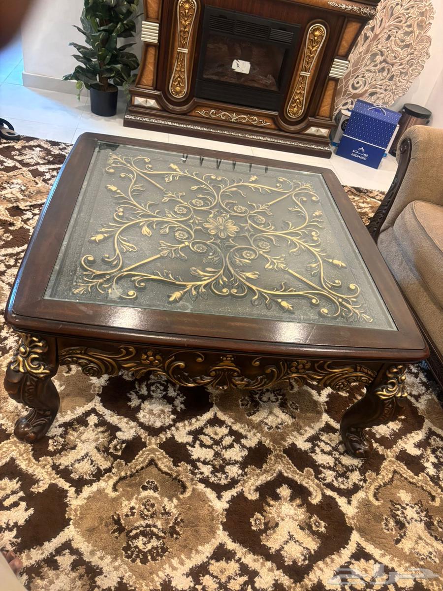 A table for the TV with a semi-new heater and a table and a set of guest tables63324538287618112