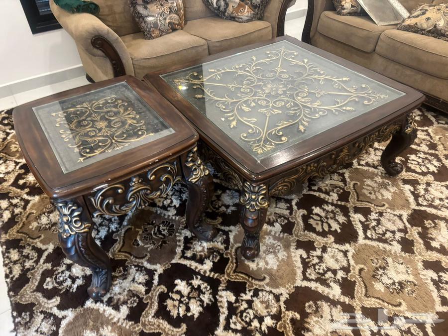 A table for the TV with a semi-new heater and a table and a set of guest tables63324538287618111