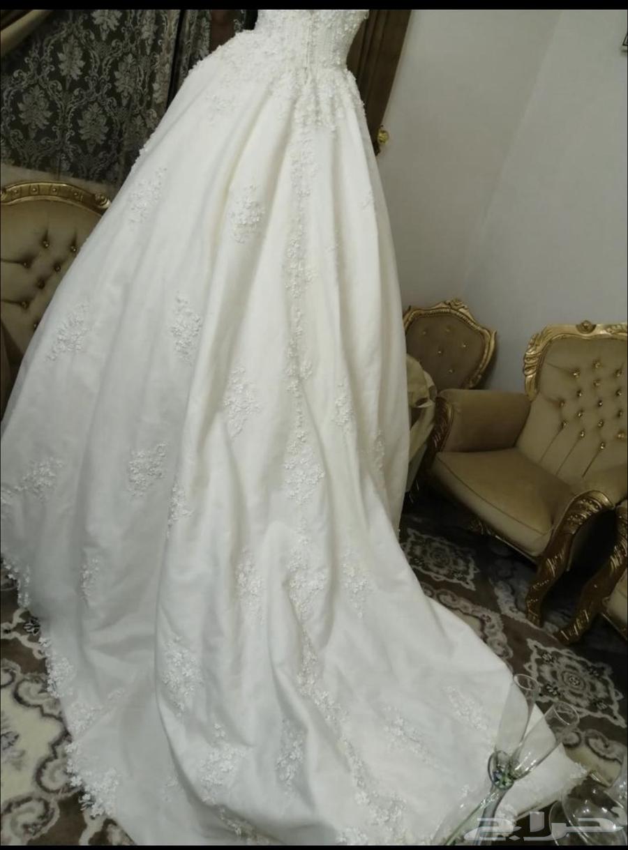 فستان زفاف مع طرحه وجيبون منه وفيه632986097344011128