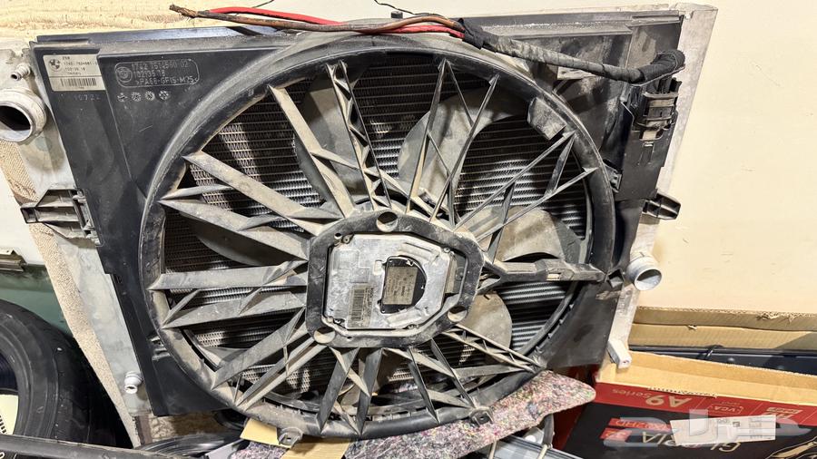 راديتر مع مروحة 7 ريش BMW 2008 اصلي63515145825410112