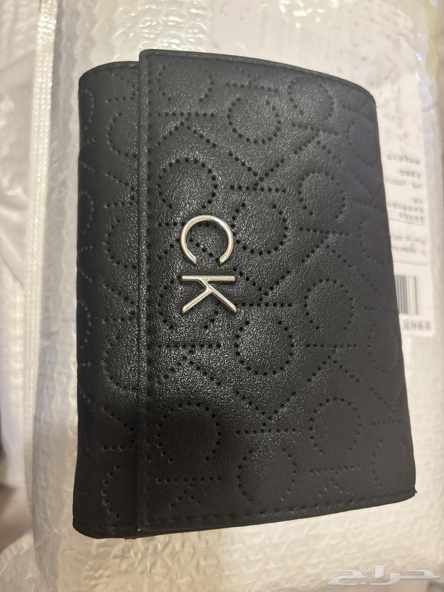A new women's Calvin Klein wallet at less than half price63281554214786110