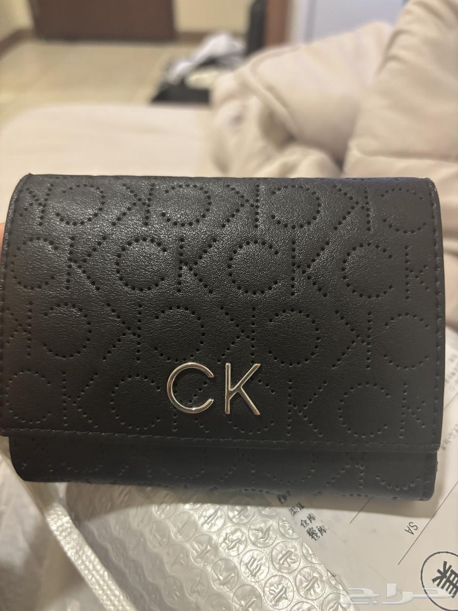 A new women's Calvin Klein wallet at less than half price63281554214786114