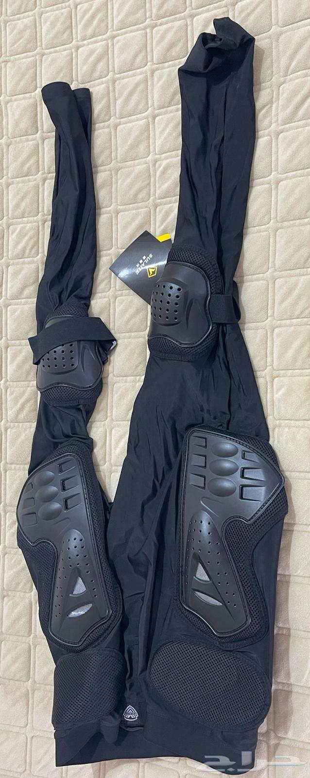 For sale, worn motorcycle safety gear and a real motorcycle helmet63271213414146112