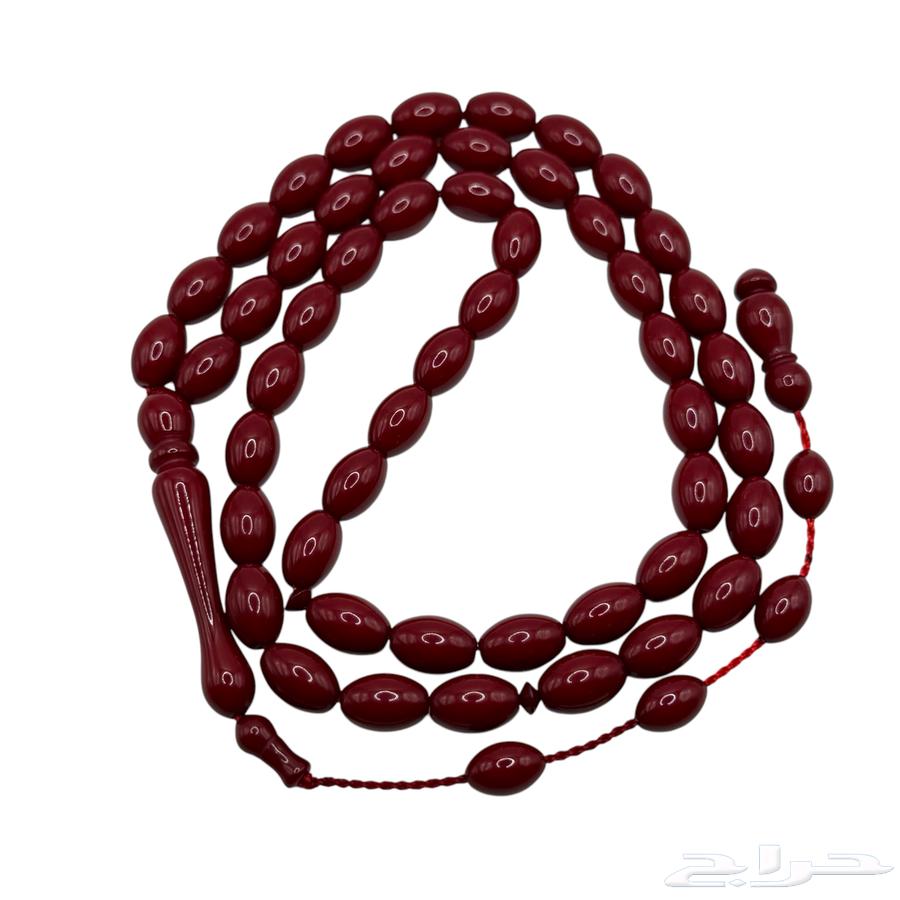 A Belgian clay rosary in deer blood purple with oval cut.63258901701507111