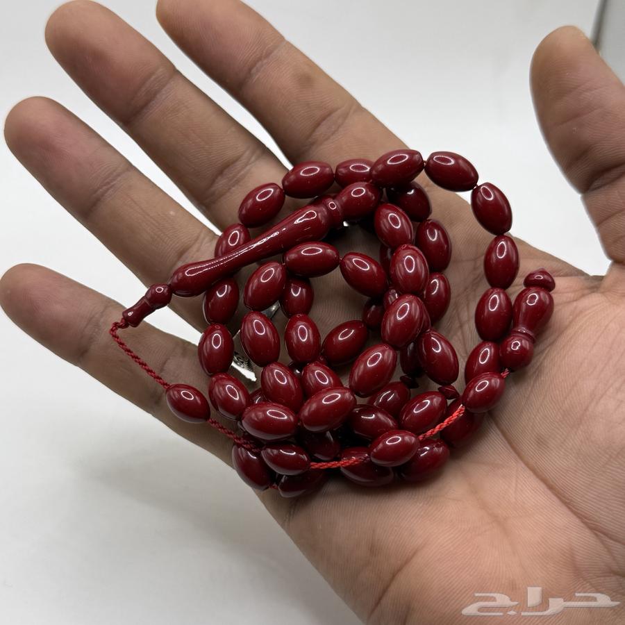 A Belgian clay rosary in deer blood purple with oval cut.63258901701507112