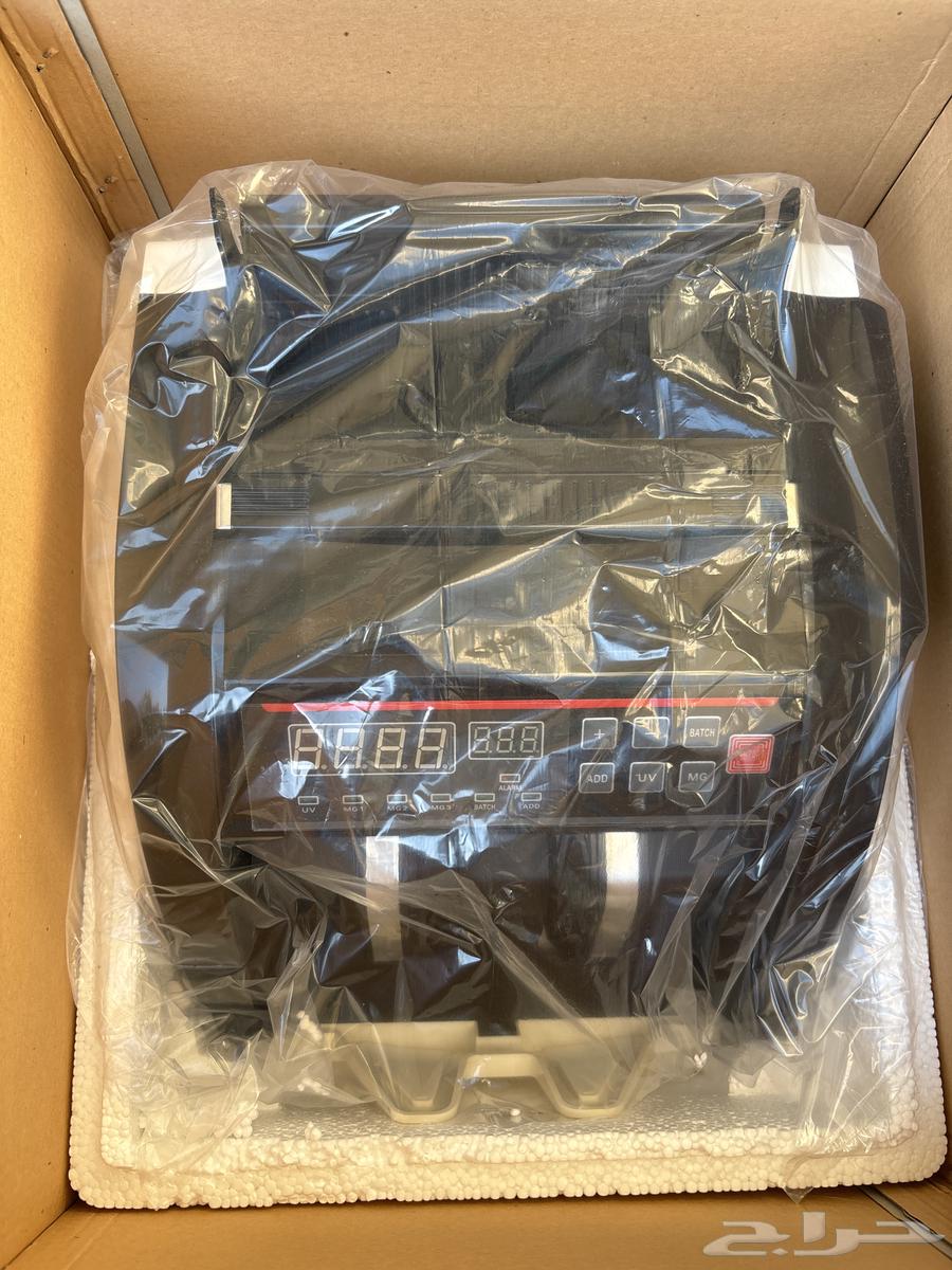 A new money counting machine, still in its original packaging and never used.63253715716354112