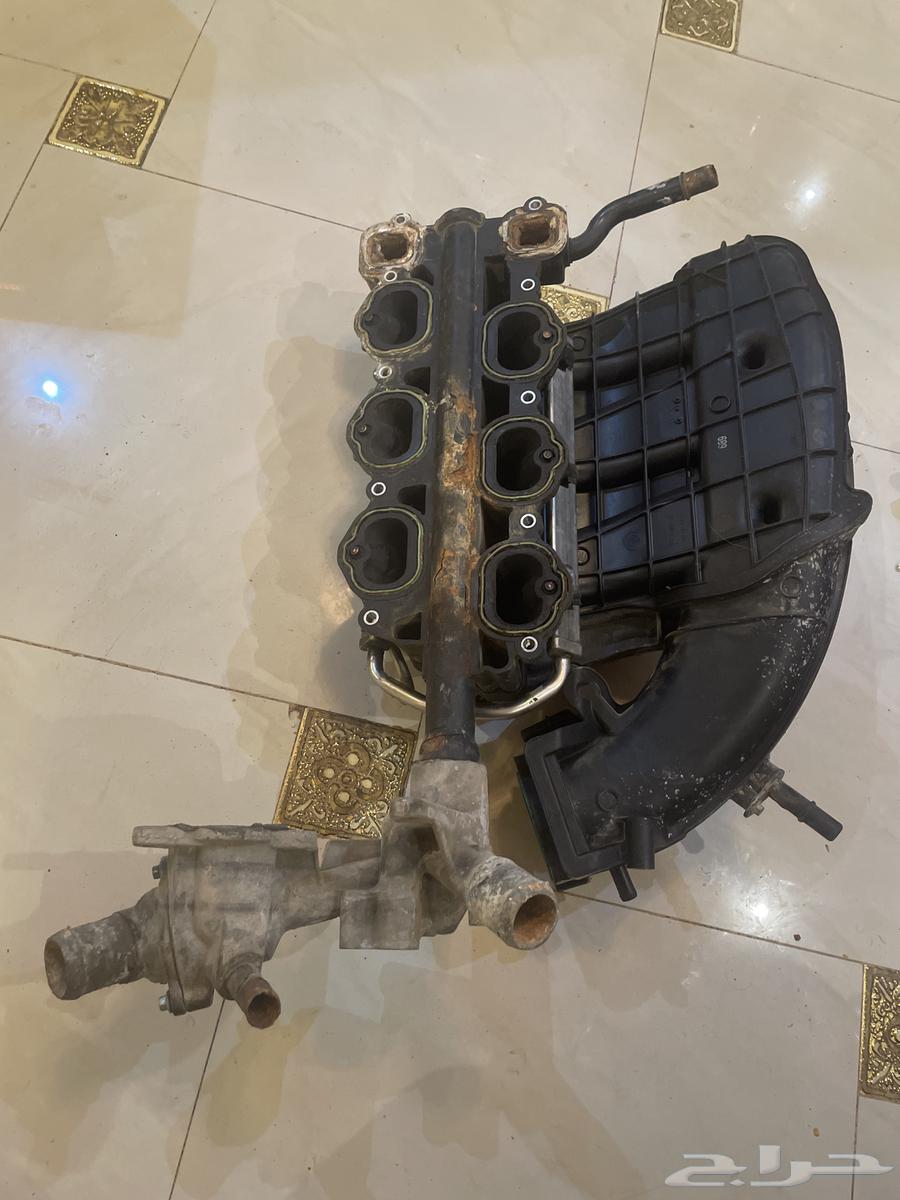 A Mustang refrigerator with spray nozzles and a spray nozzle base from 201463405424403713112