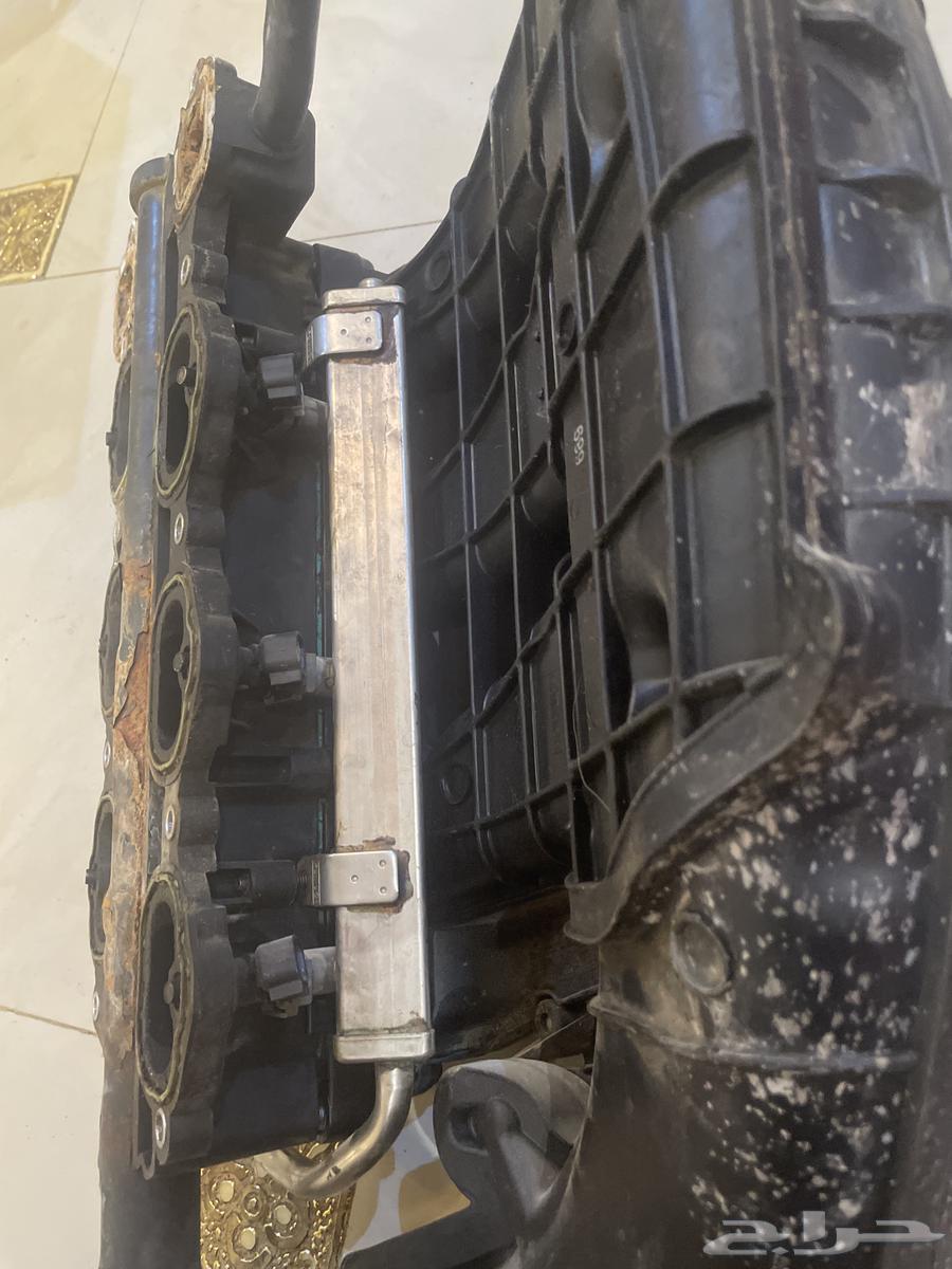 A Mustang refrigerator with spray nozzles and a spray nozzle base from 201463405424403713113