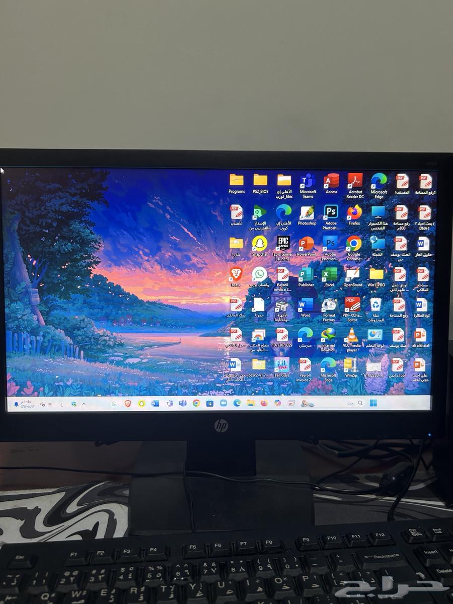 A desktop computer with a monitor, keyboard, and mouse63221565672451111