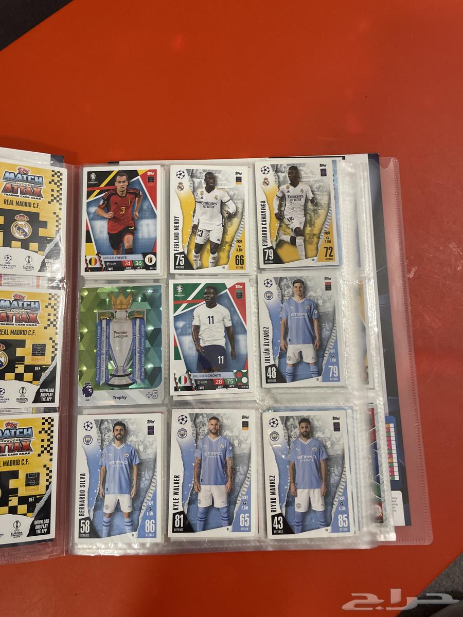 Almost 155 football cards with an album for the cards63527101273090112