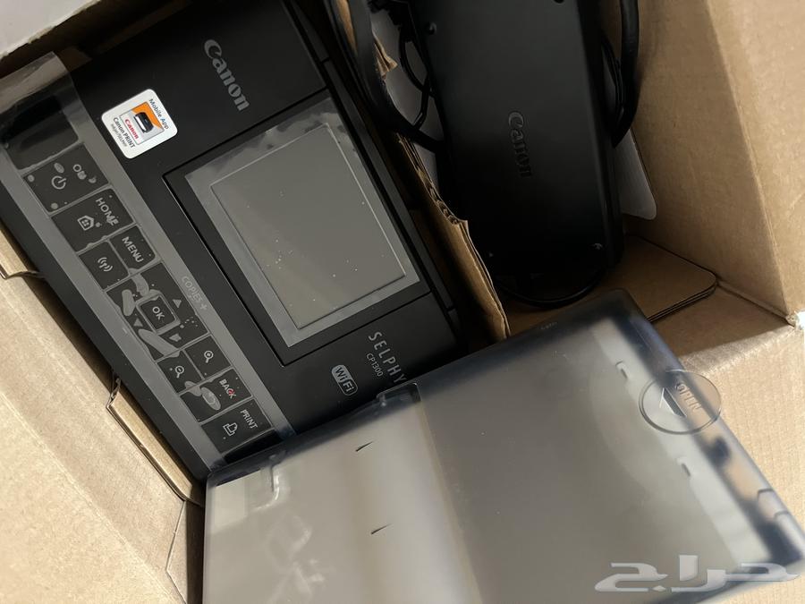 A new Canon printer, simple to use for printing photos with its ink and paper63221060080515111