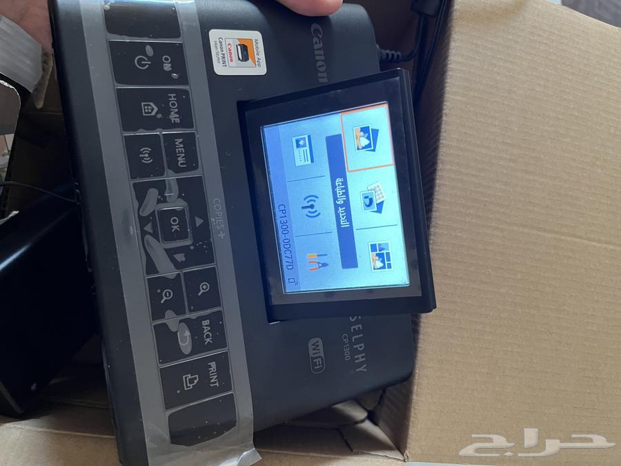 A new Canon printer, simple to use for printing photos with its ink and paper63221060080515112