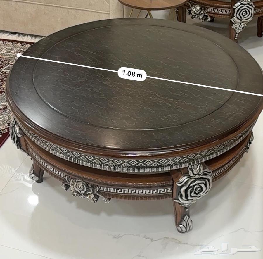 A table with a set of two small tables63526834459267113