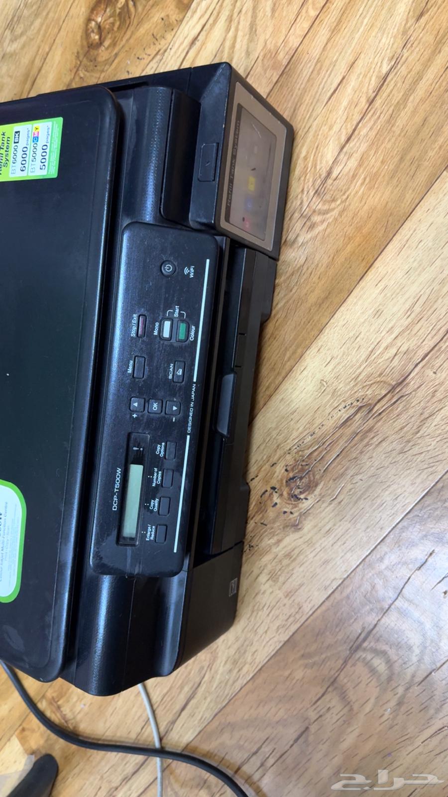 A semi-new printer for sale and a new 3M air purifier63215575286785111