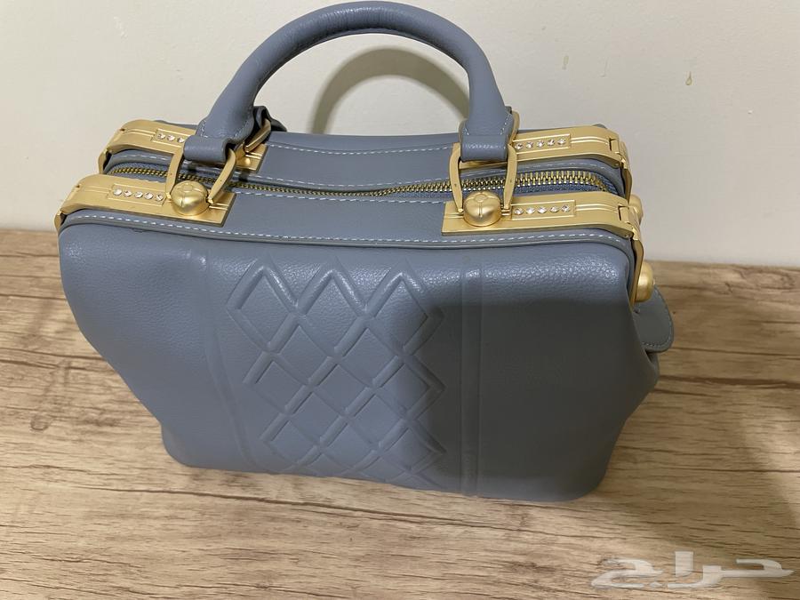 A bag in sky blue color.. selling allowed 8063213141671681111