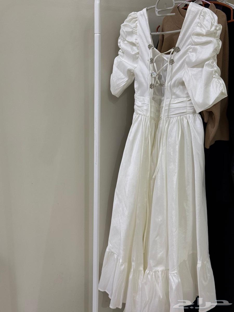 A new cotton dress, worn once, size XS, for confusing age.63206116182403112