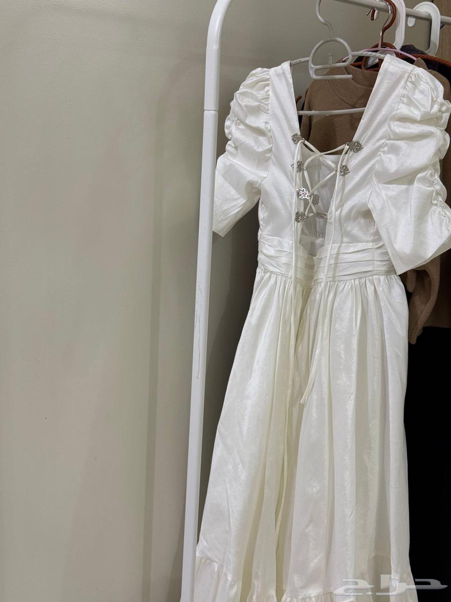 A new cotton dress, worn once, size XS, for confusing age.63206116182403111
