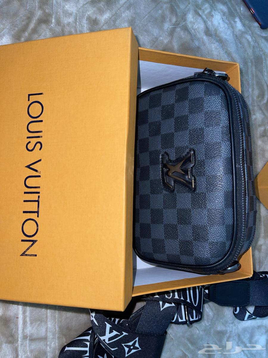 T-shirts, two pairs of shoes, and two bags for sale. All items are brand new and authentic.63199833027969112