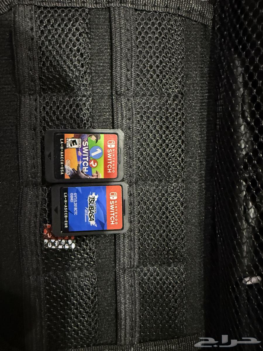 Nintendo Switch used for sale with games and controller63197877378562112