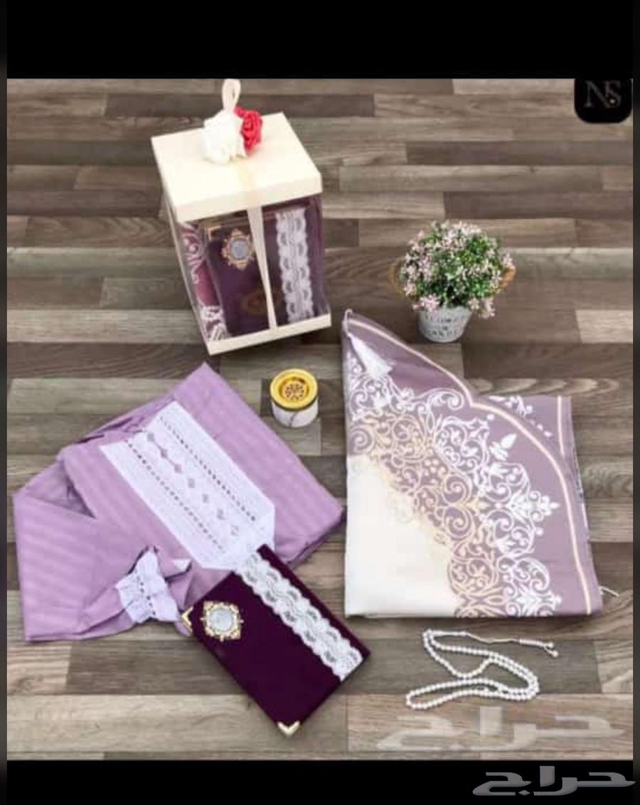 Prayer robe set, incense burners, Qur'ans, and a book with name inscription63205590538242113