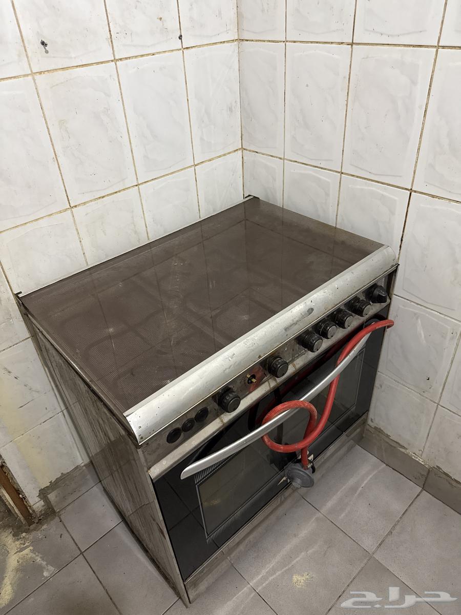 Refrigerator, 5-burner cooker, washing machine, bedroom set with large bed and mattress63509941870850114