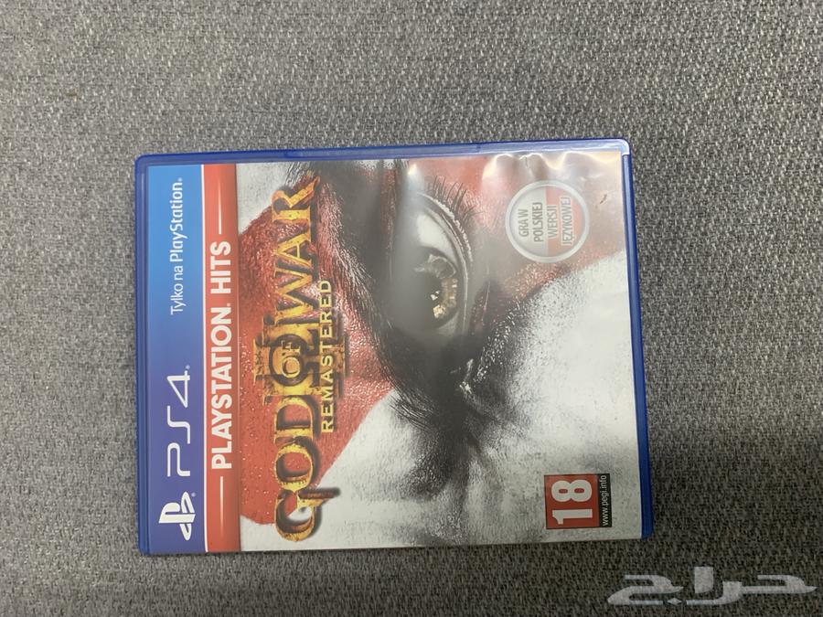 Sony 5 regular user with mouse, keyboard, and God of War 3 game disc.63173251889921113