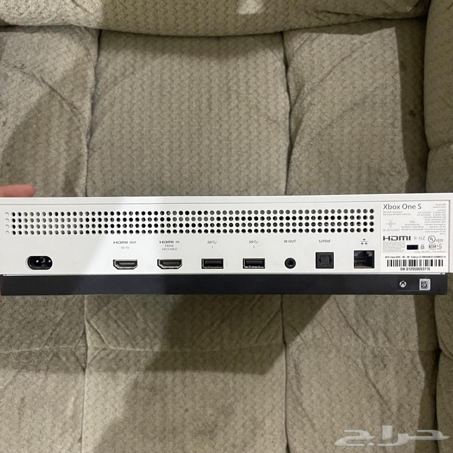 Xbox S with her hand63175039780481113