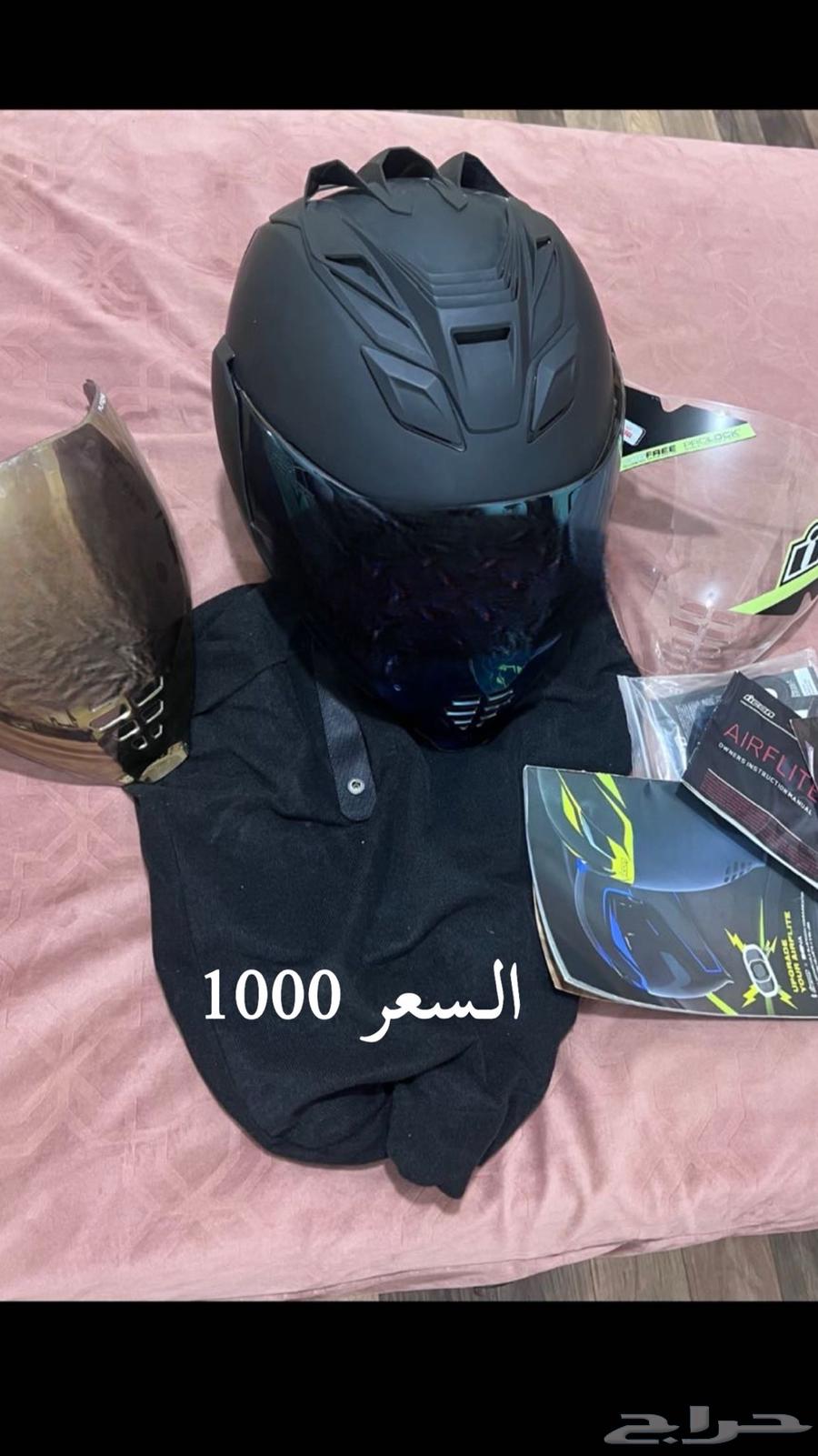 An ICON helmet with blue, transparent, and gold cover, used for less than a month63254546756737115