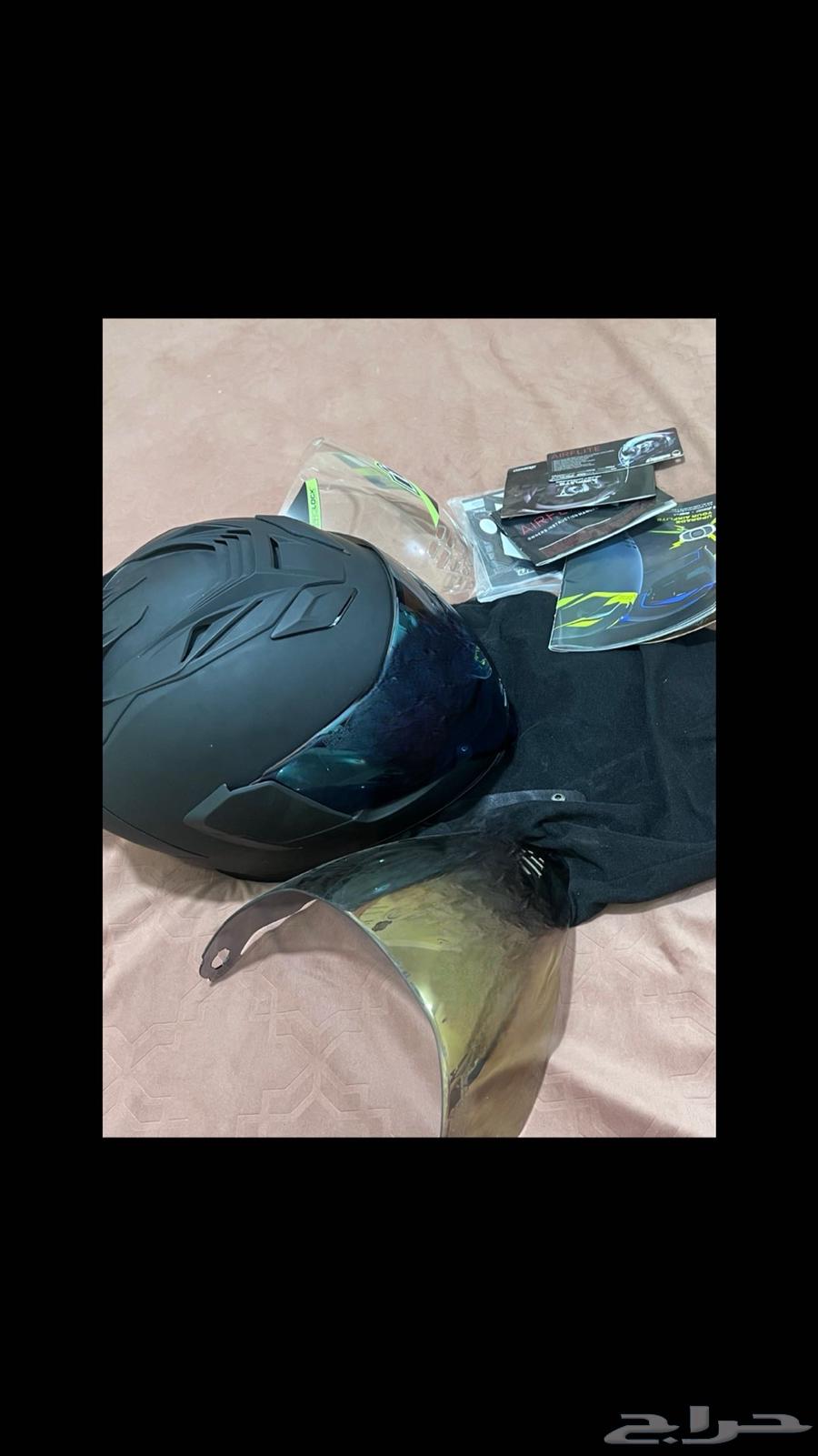 An ICON helmet with blue, transparent, and gold cover, used for less than a month63254546756737111