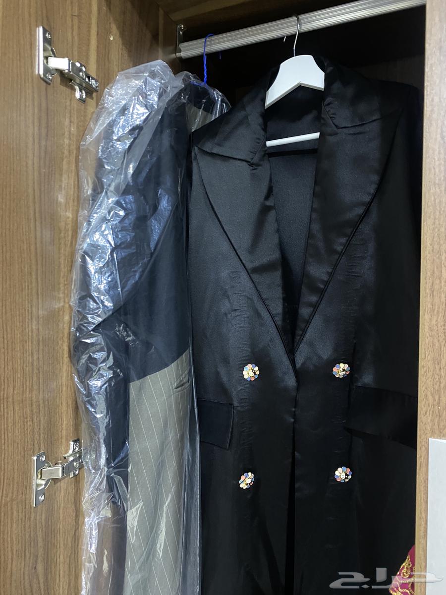 A black formal abaya with 4 buttons, without a hijab, size 5463170608310785113