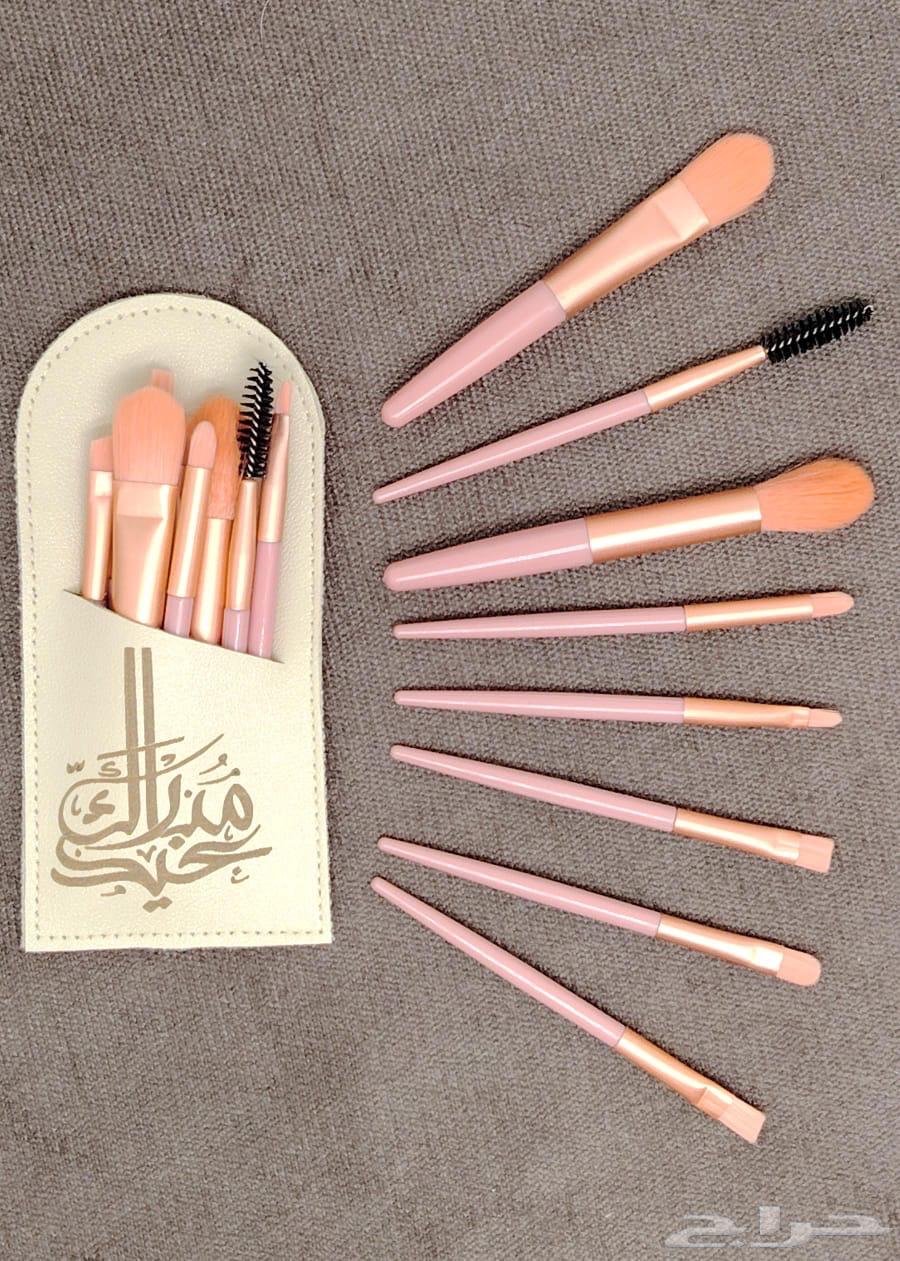 Gifts and makeup brush giveaways with a leather wallet saying "Eid Mubarak"63169190748035113