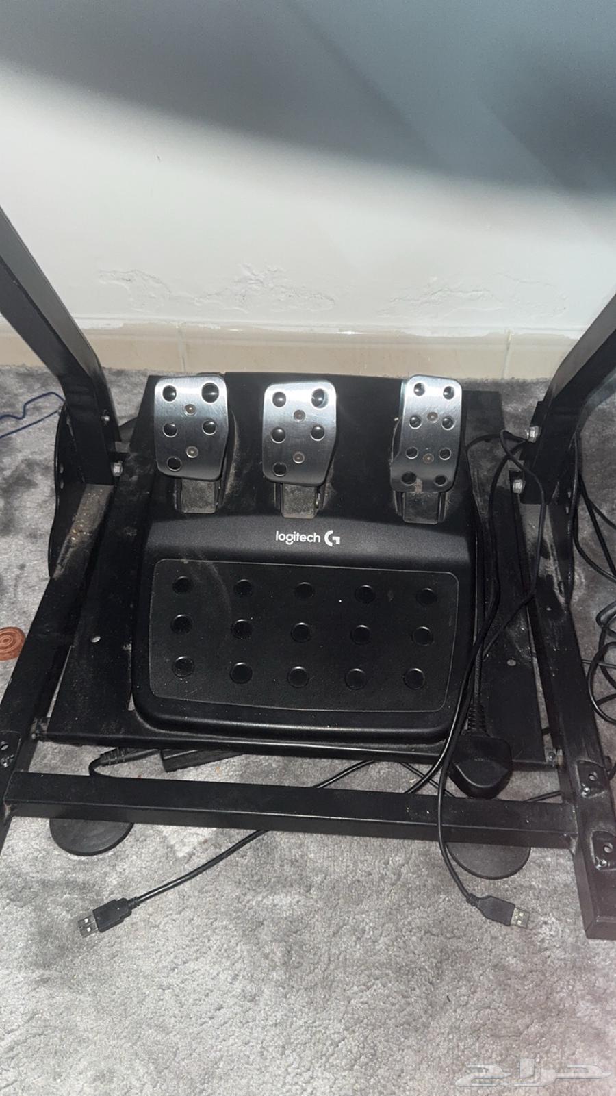 With Dexion, G29 pedals, Thrustmaster gearshift, and a base on which all of this is mounted.63168271730691112