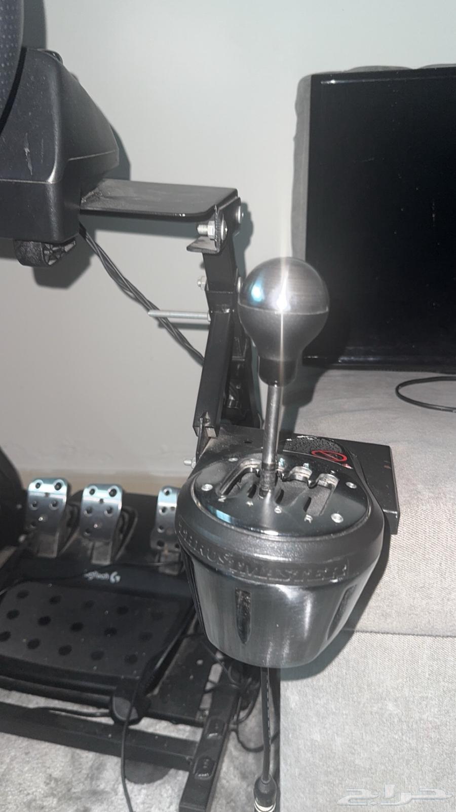 With Dexion, G29 pedals, Thrustmaster gearshift, and a base on which all of this is mounted.63168271730691111