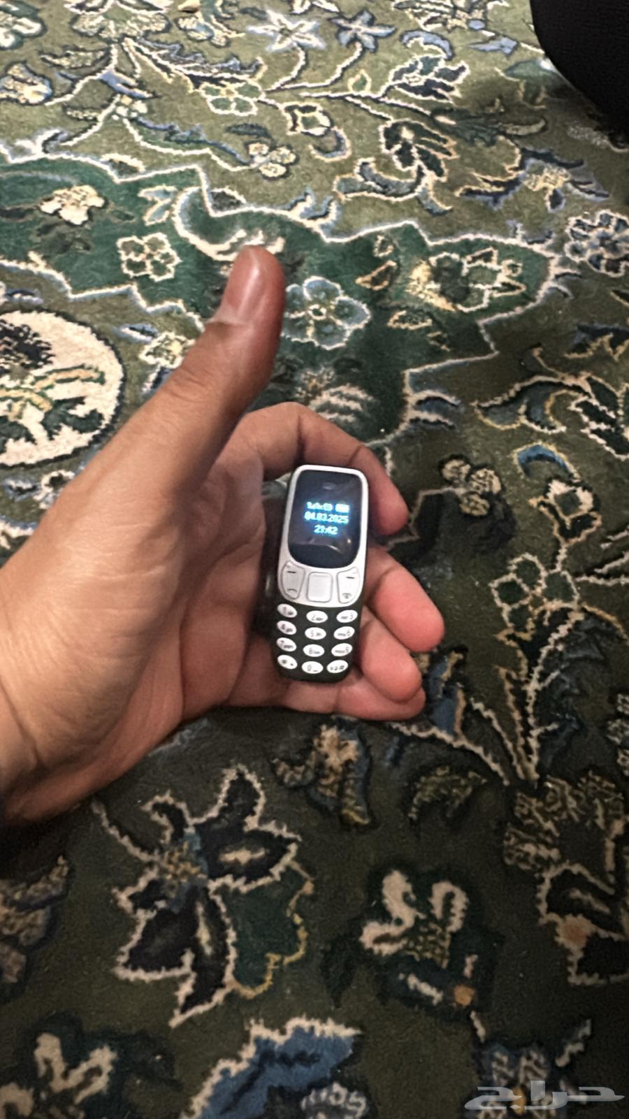 Smallest mobile phone63165460323459111