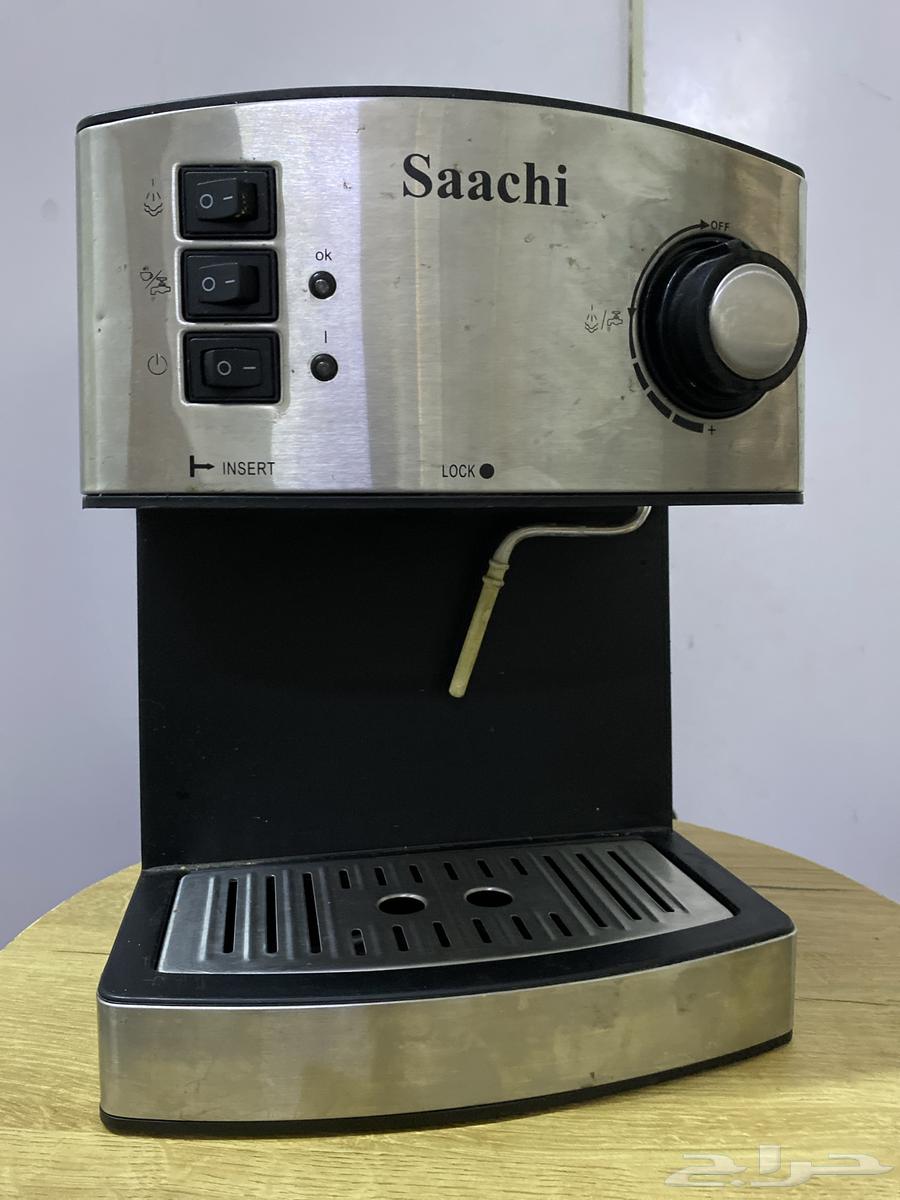 Silver-colored Staxi coffee machine with its accessories63159453849474111