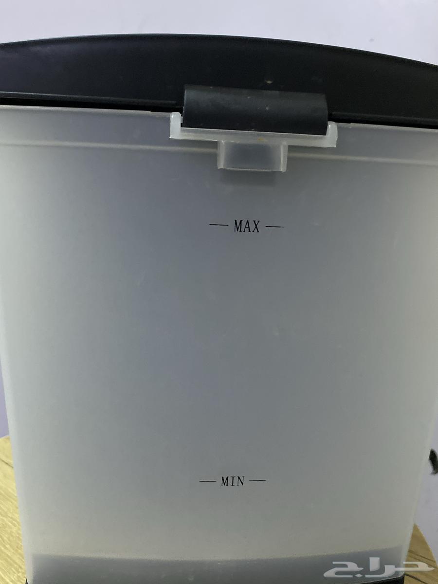 Silver-colored Staxi coffee machine with its accessories63159453849474112