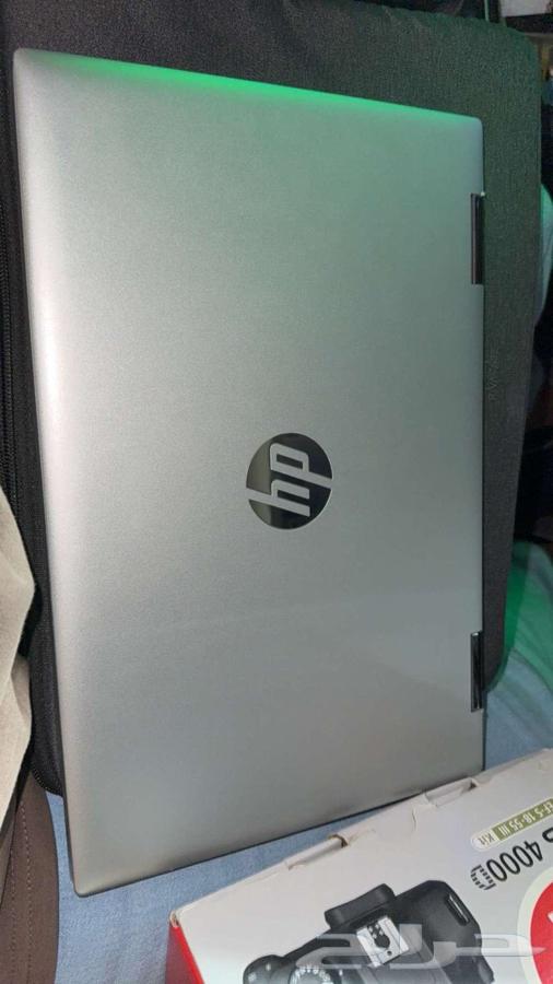Laptop and a new camera in their box63152534093314114