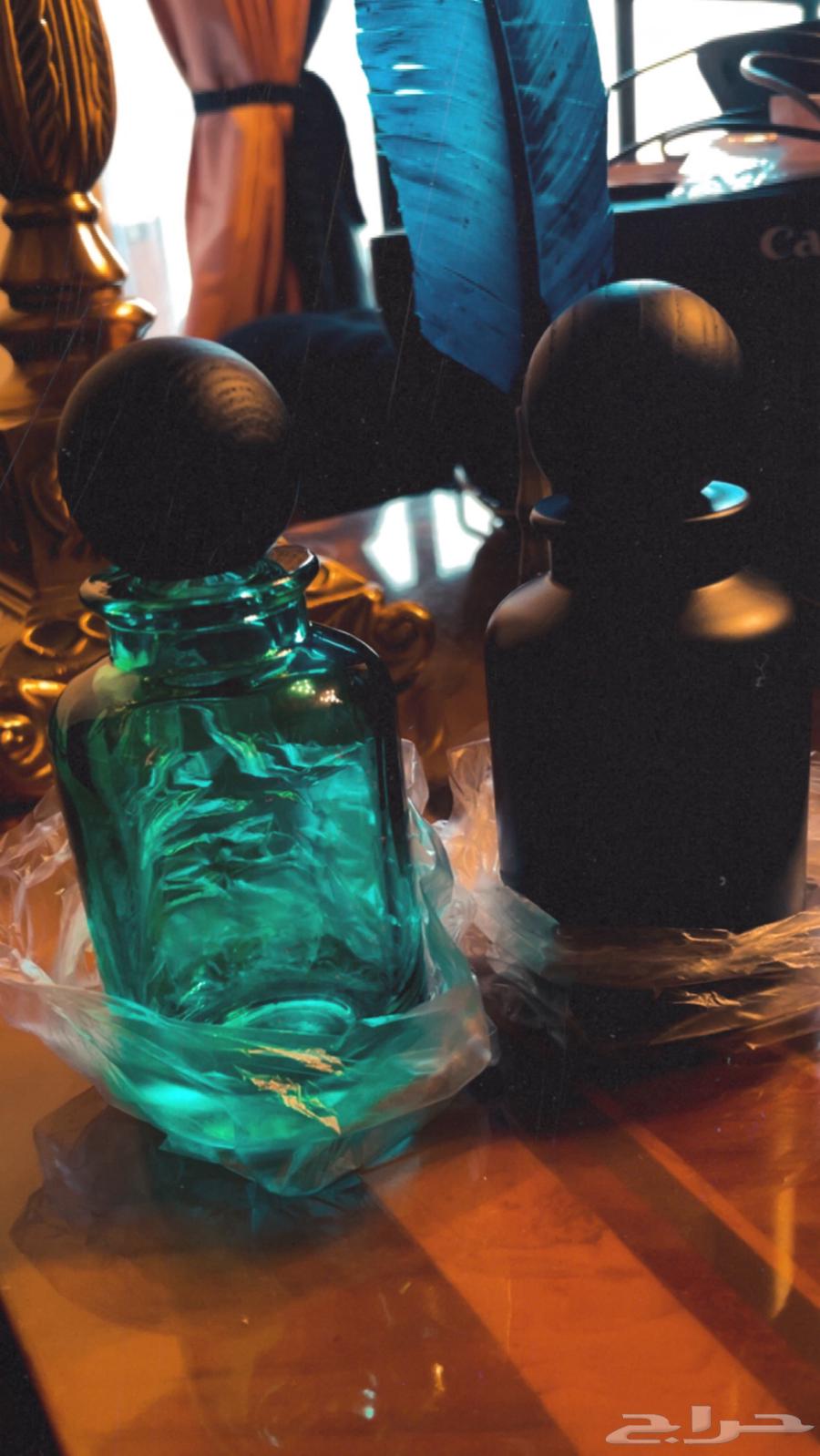 Empty 50 ml glass perfume bottles with caps for filling, including cardboard packaging.63145106974082111
