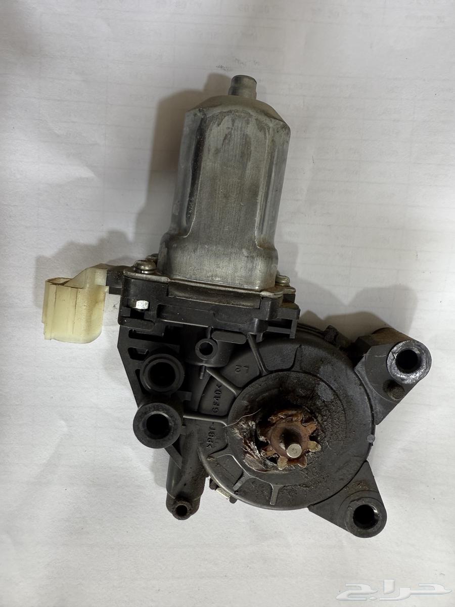 Kia Cerato 2011 driver's side car glass dynamo63203213158018111