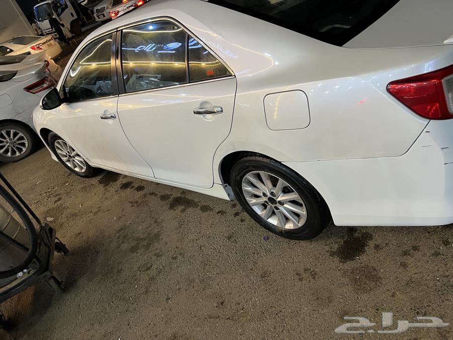 For sale: 2013 Camry with minor front-end damage and light scratches63204890233474113