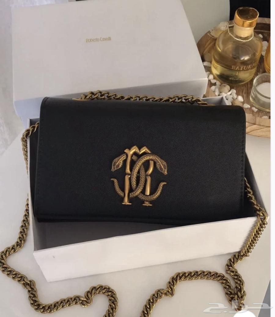 Tory Burch bag and its warranty card.63137058053633111